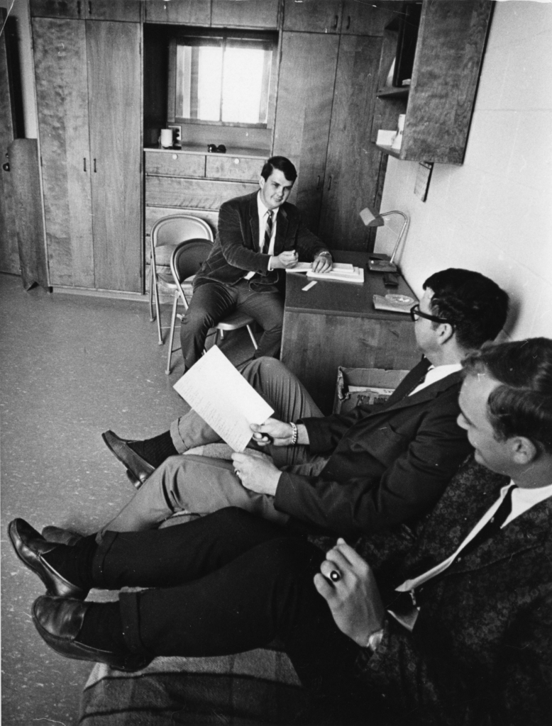 Students sitting in a dorm room on the new Waltham campus, 1969