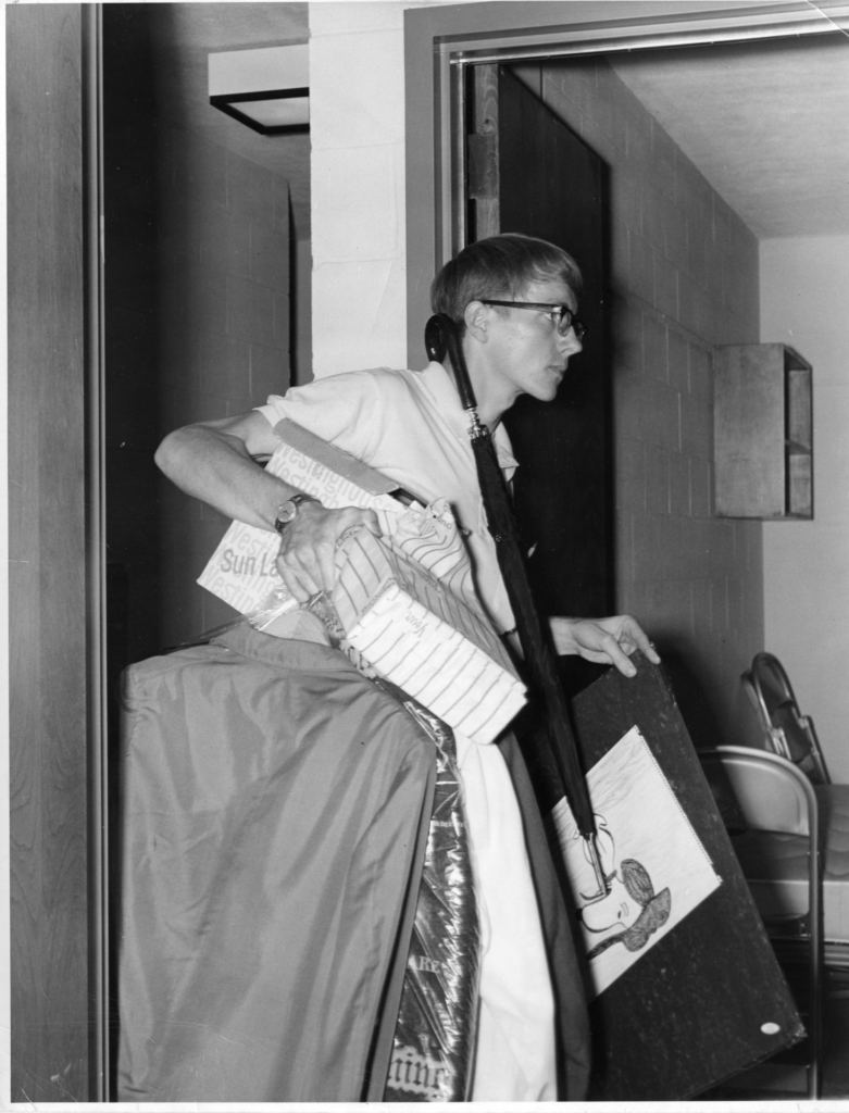 A student moving into a dorm on the new Waltham campus, 1969