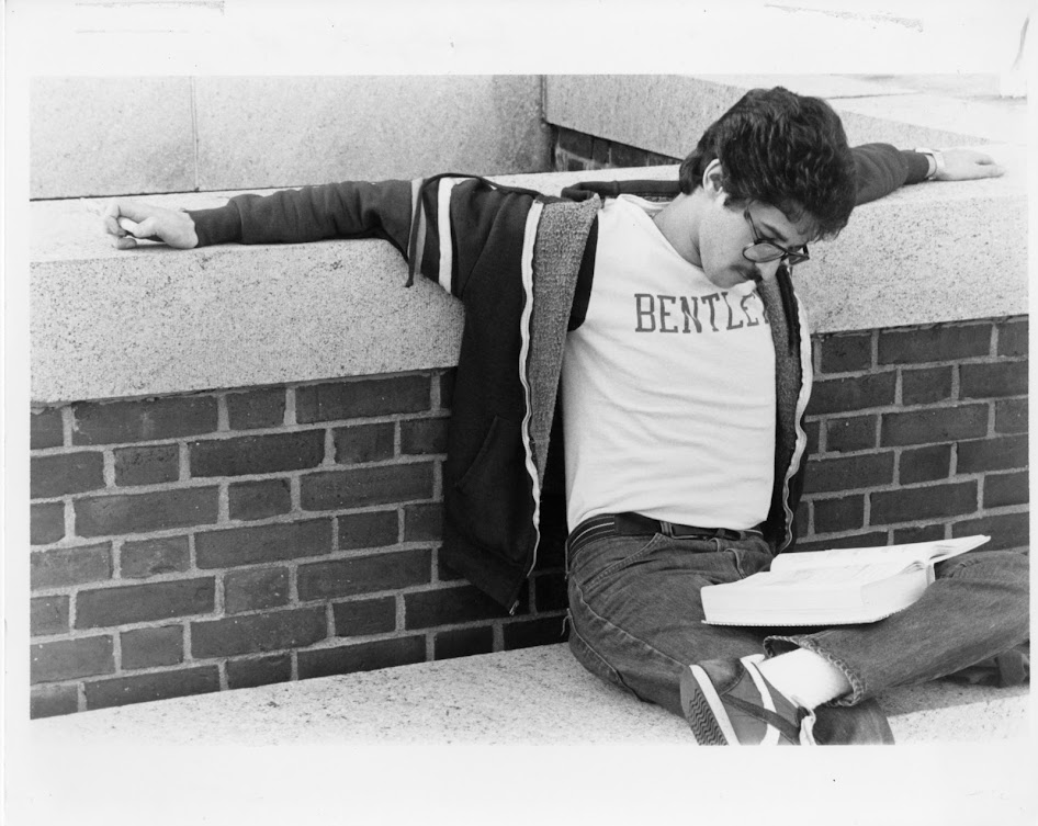 Bentley student studying outside