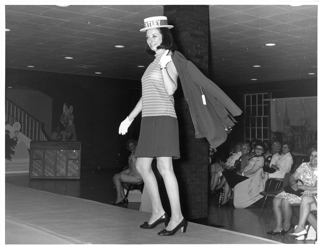 Alumna modeling straw hat