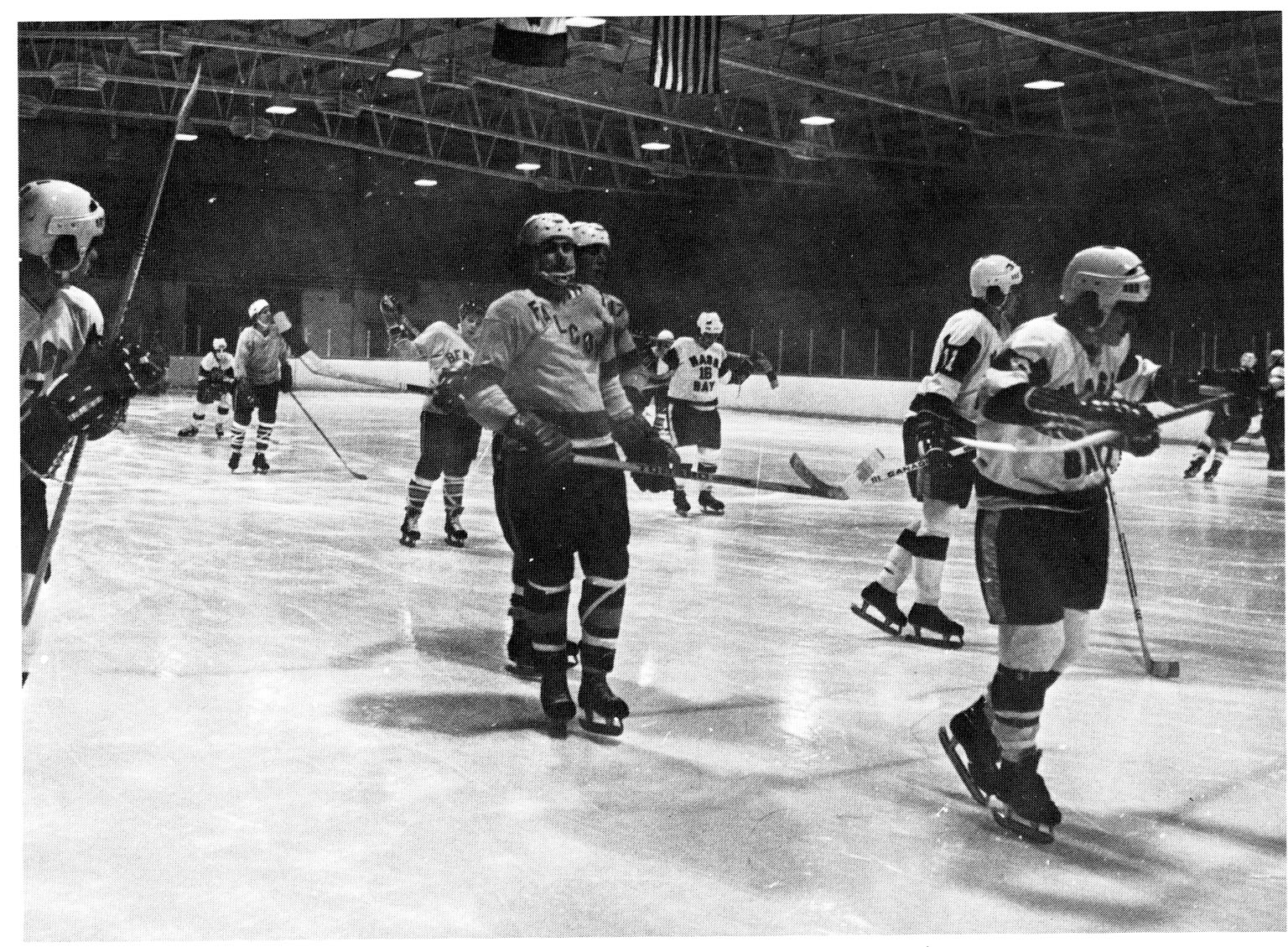 Bentley Men's Hockey Players on ice, 1975